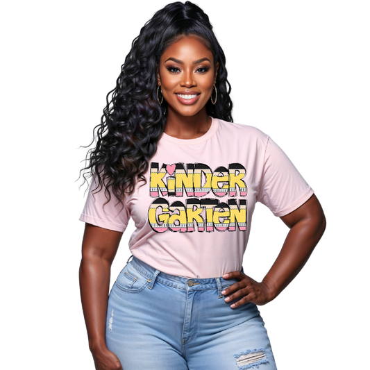 Woman wearing a pink t-shirt with colorful text and blue jeans on a white background